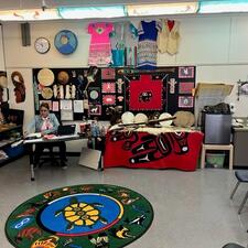 Indigenous room full of indigenous art, drums, and décor.
