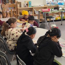 Children reading in a library.