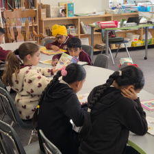 Children reading in a library.