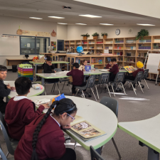 Children reading in a library.