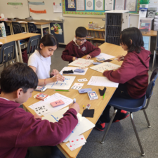 Students playing math games.