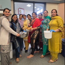 Ladies preparing food.